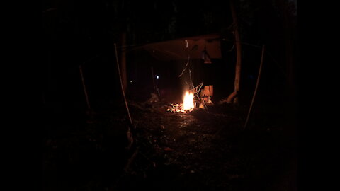 Setting up the camera to film digging a firepit