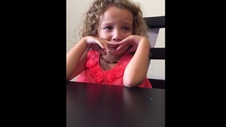 Little girl is sorry for cutting her sister's hair