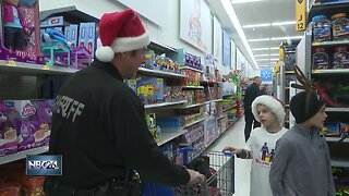 More than 160 local kids Shop with a Cop for Christmas