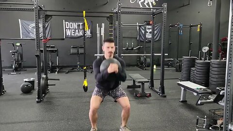 Med Ball Front Carry Squats
