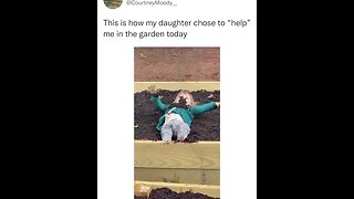 Toddler enjoying in the garden box instead of helping her mother.