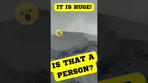 Man claims he spotted a GIANT on top of a mountain…