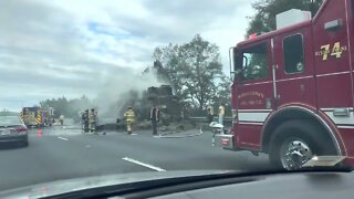Bales of hay on fire on highway