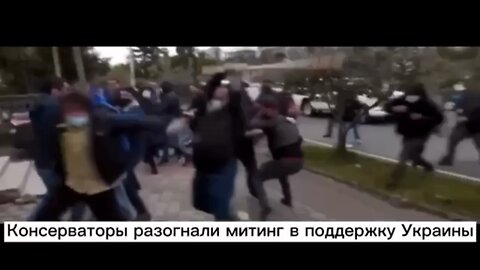 Angry Georgians ending a pro Ukrainian rally