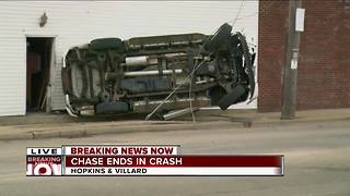 Car chased by police hits building