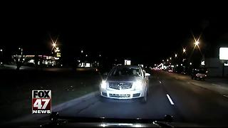 New dashcam video of Michigan cop driving the wrong way