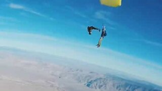 Skydivers pull crazy stunt midair