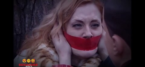 Russian MILF has her mouth taped with red tape