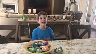 Braden paints rocks for neighbors