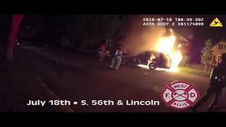 VIDEO: West Allis firefighters rescue person from a burning car