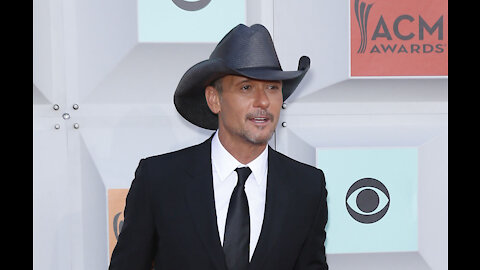 Country music star Tim McGraw is the godfather of Emma Roberts' son