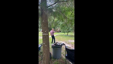 90 year old man shooting hand cannon one handed