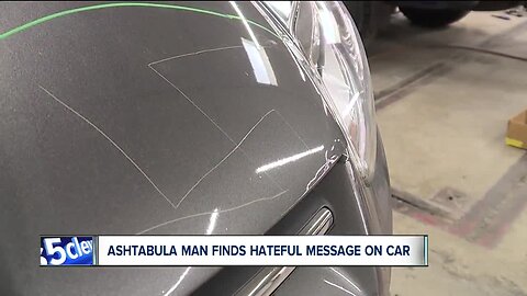 Man finds two swastikas carved into hood of car