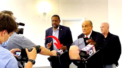 Why Was a CNN Reporter Pointing a FOX Mic at Vernon Jones?