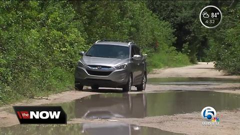 Loxahatchee residents still dealing with standing water