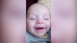 Cute Newborn Baby Boy Makes Funny Faces While He Sleeps