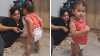 Little Girl Hysterically Destroys Dad's Building Blocks