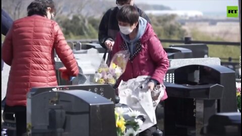 RELATIVES OF 2011 EARTHQUAKE VICTIMS GATHER AT FUKUSHIMA CEMETERY C03