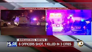 6 officers shot, 1 killed