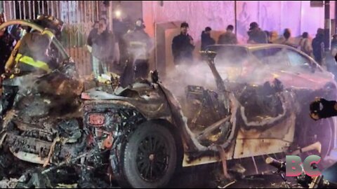 Robotaxi goes up in flames after crowd attacks vehicle