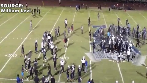 Police pepper spray crowd during fight after high school football game