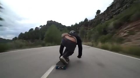 Extreme Downhill Skateboarding At High Speeds