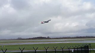 Great Plane Spotting at MAN Manchester Airport UK. Super take offs in wet windy weather.