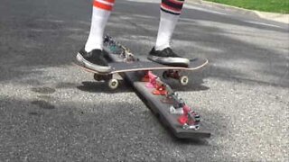 Skater grinds on skateboard parts