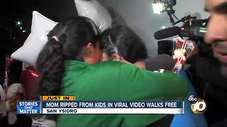 Mom ripped from kids in viral video walks free