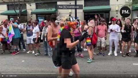 Naked Man in Bugs Bunny mask hops through Toronto Pride Parade with many children in attendence