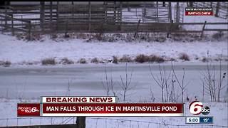 Man critical after falling through ice while fishing on Martinsville pond