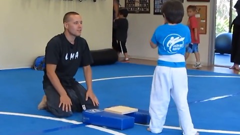 Sensei Inspires Young Karate Kid To Break A Wooden Board