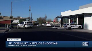 Man holding baby, firing a gun, shot by Phoenix police