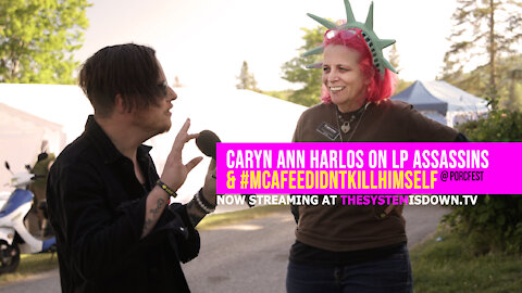 251: Caryn Ann Harlos on LP Assassins & #McAfeeDidntKillHimself (@ PorcFest 2021)