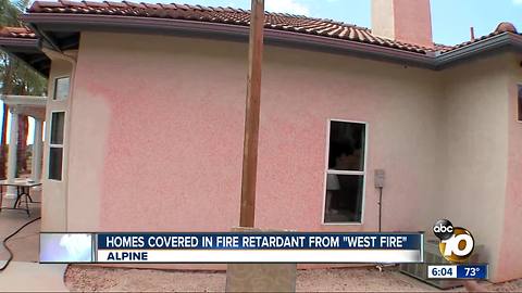 Homes covered in fire retardant from West Fire