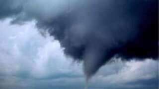 Storm chasers are surprised by a tornado in the USA