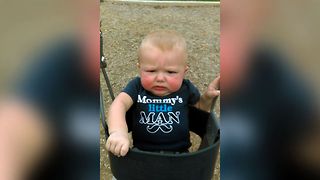 Baby Makes Hilarious Face While Swinging