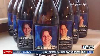 Parents give teachers bottles of wine with kid's pic