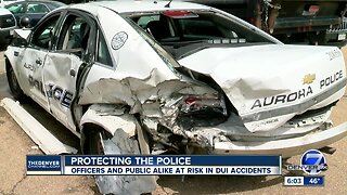 Aurora officers narrowly avoid being hit by suspected drunk driver