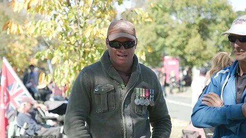 Veterans turn their backs on The Governor General's convoy in Canberra