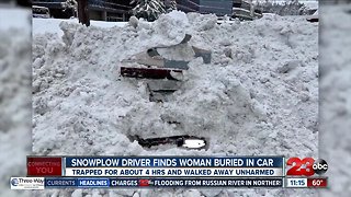 Woman buried in snow in her car for hours