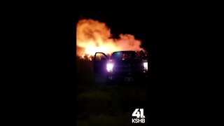 Fans exiting Arrowhead Stadium capture fiery brush blaze