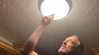 How to remove a stuck twist on glass shade from a dome light fixture