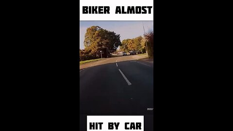 Biker almost hit by car 😱