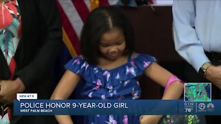 Police honor 9-year-old girl who helped fight off attacker