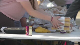 Free food and prayers handed out to neighbors of Black Rock Community