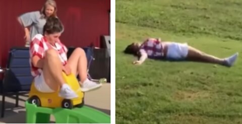 Woman On Slide Faceplants On Grass Fail Funny