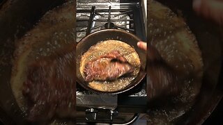 Steak taking a butter bath