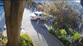 Possible Stolen Car Smashes Thru Gate Plunges Down Hill Over Stairs