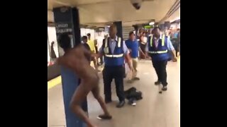 Naked Man Goes Crazy In NYC Subway